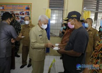 Bupati Asahan Serahkan Bantuan Beras Dan Uang Transpor Kepada Kaum Dhuafa