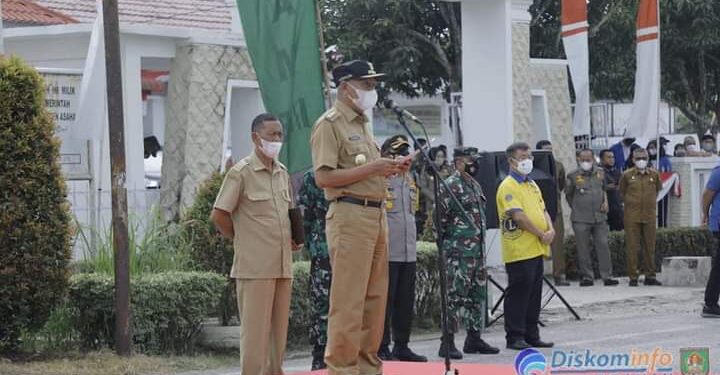 Bupati Asahan Pimpin Apel Penyemprotan Massal Atasi Penyebaran Virus Covid-19