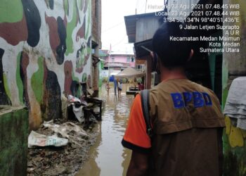 air Sungai Deli meluap sehingga Kota Medan, Provinsi Sumatera Utara