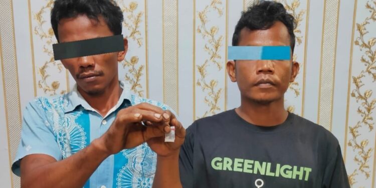 Reskrim Polsek Pulau Raja Ringkus Dua Pelaku Transaksi Sabu—Sabu