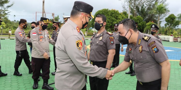 Kapolres Natuna Pimpin Upacara Korp Raport Kenaikan Pangkat 26 Personil