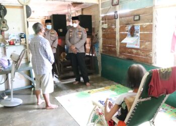Kapolres Karimun Bantu Warga Pengidap Kanker Dan Panti Asuhan Baiturrahmah