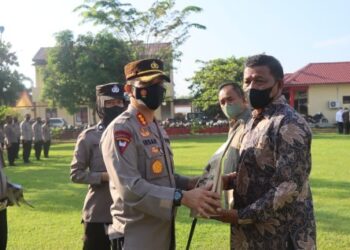 Kapolresta Deli Serdang Pimpin Upacara Purna Bakti
