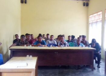 Polres Padang Lawas Hadiri Musyawarah Pra Pemungutan Suara Pilkades Tahun 2022 di Huristak