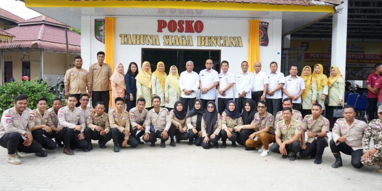 Bupati Asahan Serahkan Bansos dan Resmikan Posko Tagana
