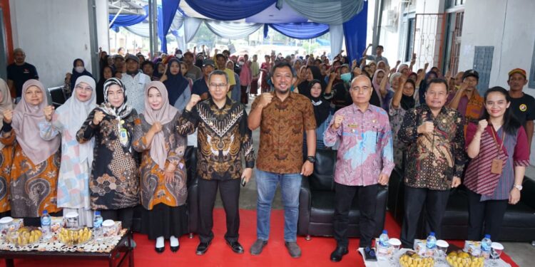 Bupati Asahan Salurkan Bantuan Pangan Cadangan Beras Pemerintah