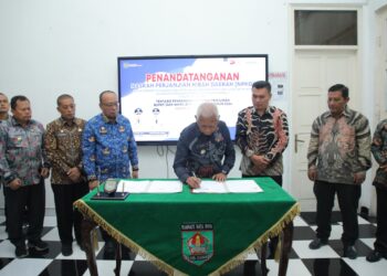 Pemkab Asahan dan  KPU Lakukan Penandatanganan NPHD