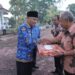 Bupati Asahan Beri Penali Kepada ASN Pensiun pada Peringatan HKN