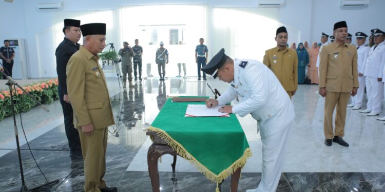 Bupati Asahan Kukuhkan Masa Jabatan 8 Tahun Kepala Desa