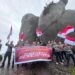 Polres Natuna Kibarkan Bendera Merah Putih di Puncak Gunung Ranai