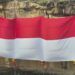 Aksi Luar Biasa Basarnas Natuna Kibarkan Bendera Merah Putih 48 Meter di Atas Tebing Tanjung Datuk
