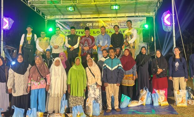 Kehangatan Malam Penutupan Turnamen KPDN Sungai Hulu: Raja Mustakim Berbagi Sembako dan Kebahagiaan dengan Warga