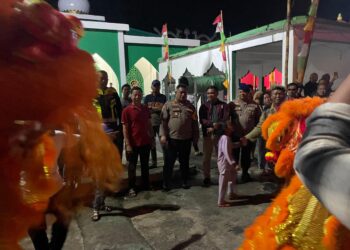 Imlek 2577 di Penagi Meriah, Kapolres Natuna Turun Langsung Jaga Keamanan