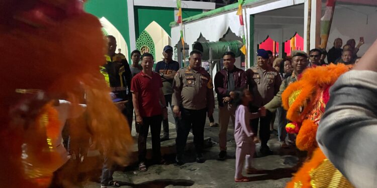 Imlek 2577 di Penagi Meriah, Kapolres Natuna Turun Langsung Jaga Keamanan